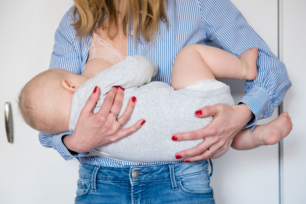 What Breastfeeding Really Does to Your Boobs featured image