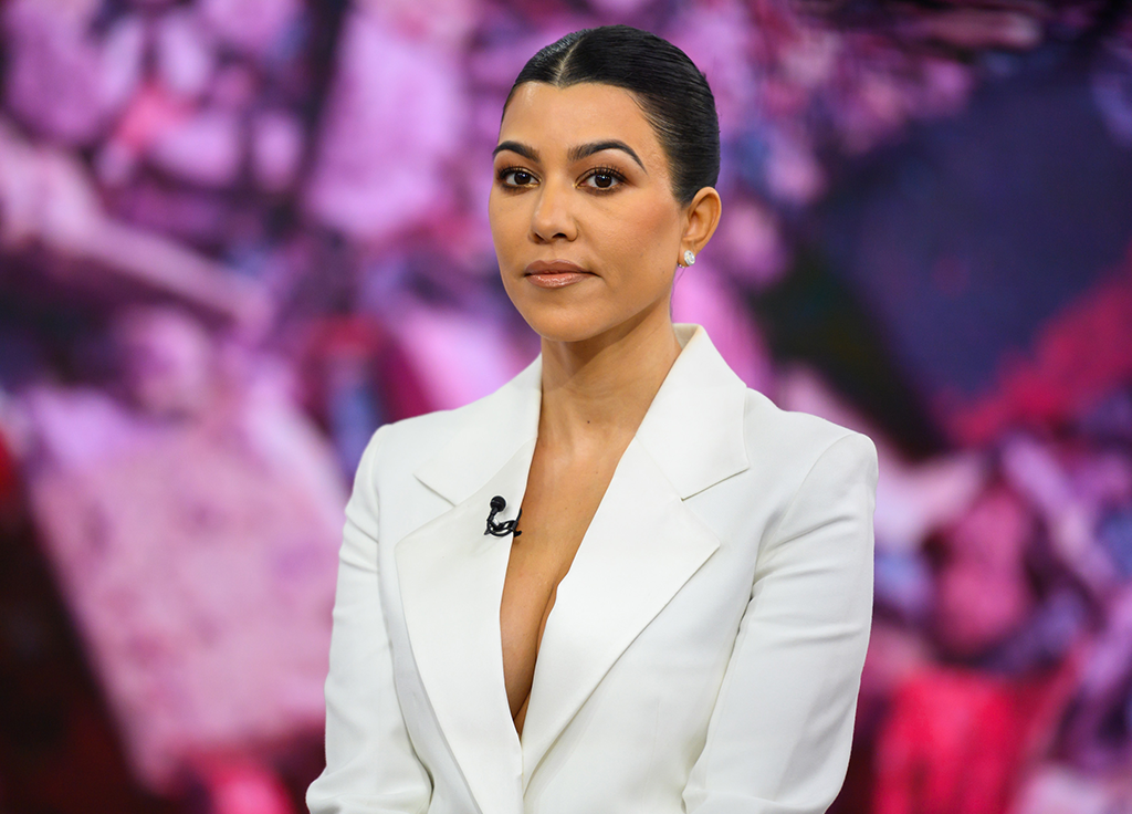 Kourtney Kardashian’s Makeup Artist Just Broke Down Her Purple-Glossy Lid Look and the Lineup Is Surprising featured image