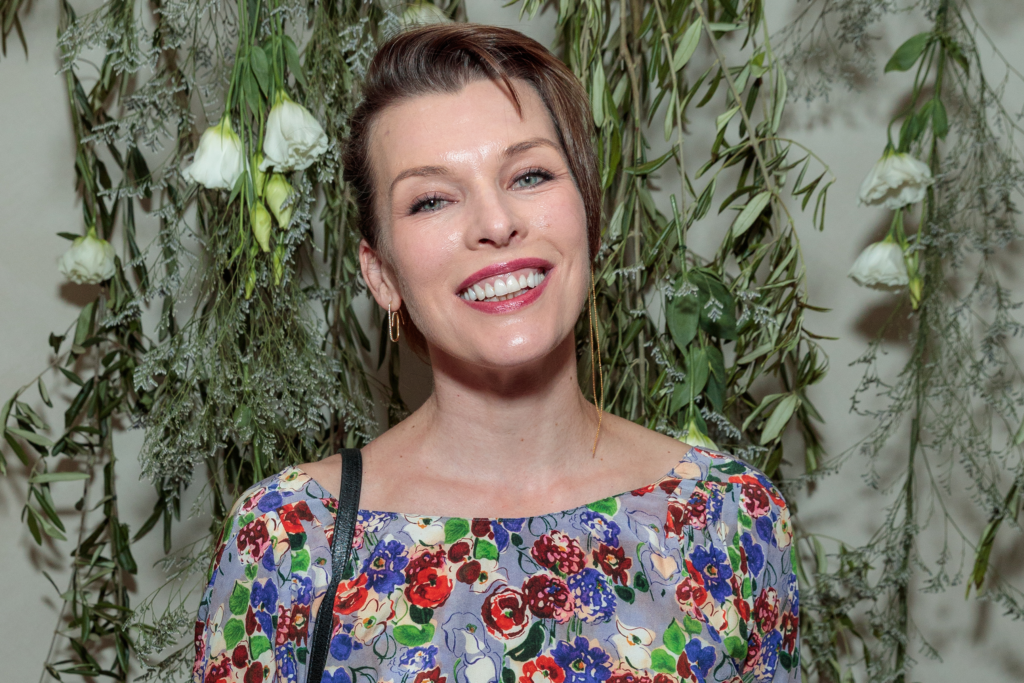 Milla Jovovich’s Number-One Anti-Aging Tip Is Sleeping on Her Back featured image